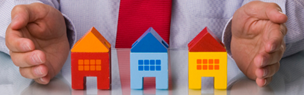 Multi-colored Toy Homes represent various mortgage
 types